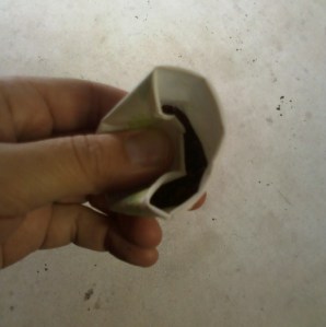 Using the walls of the cup, mold the Stud Muffin back into its original shape